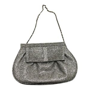 Miss KG Clutch with Chain Strap and a Bow Accent on the Front Silver